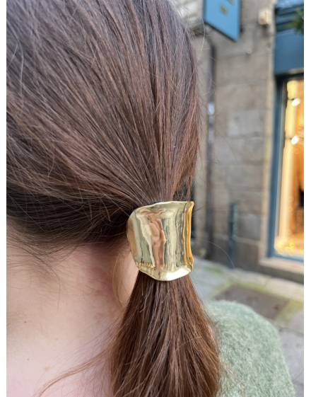 Elastique à cheveux avec bijou ovale doré