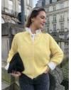 Gilet jaune en laine à boutons blancs
